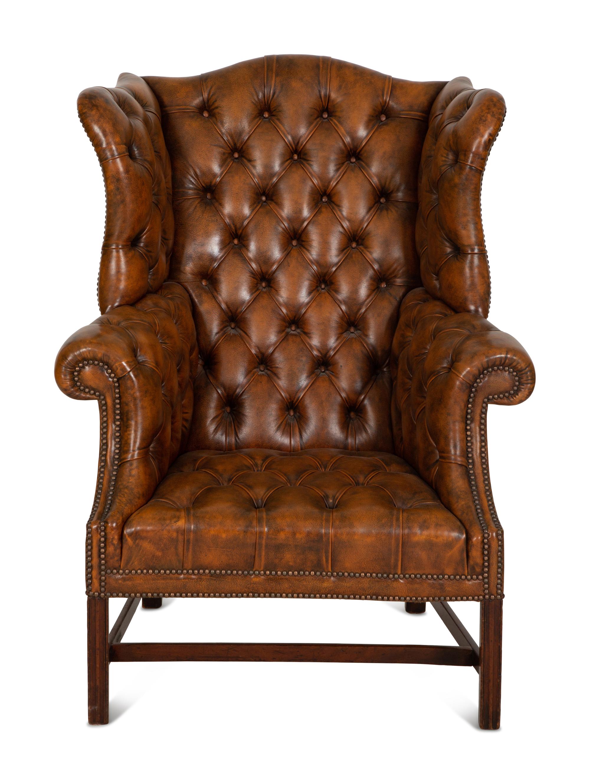 An English Leather-Upholstered Wingback Armchair