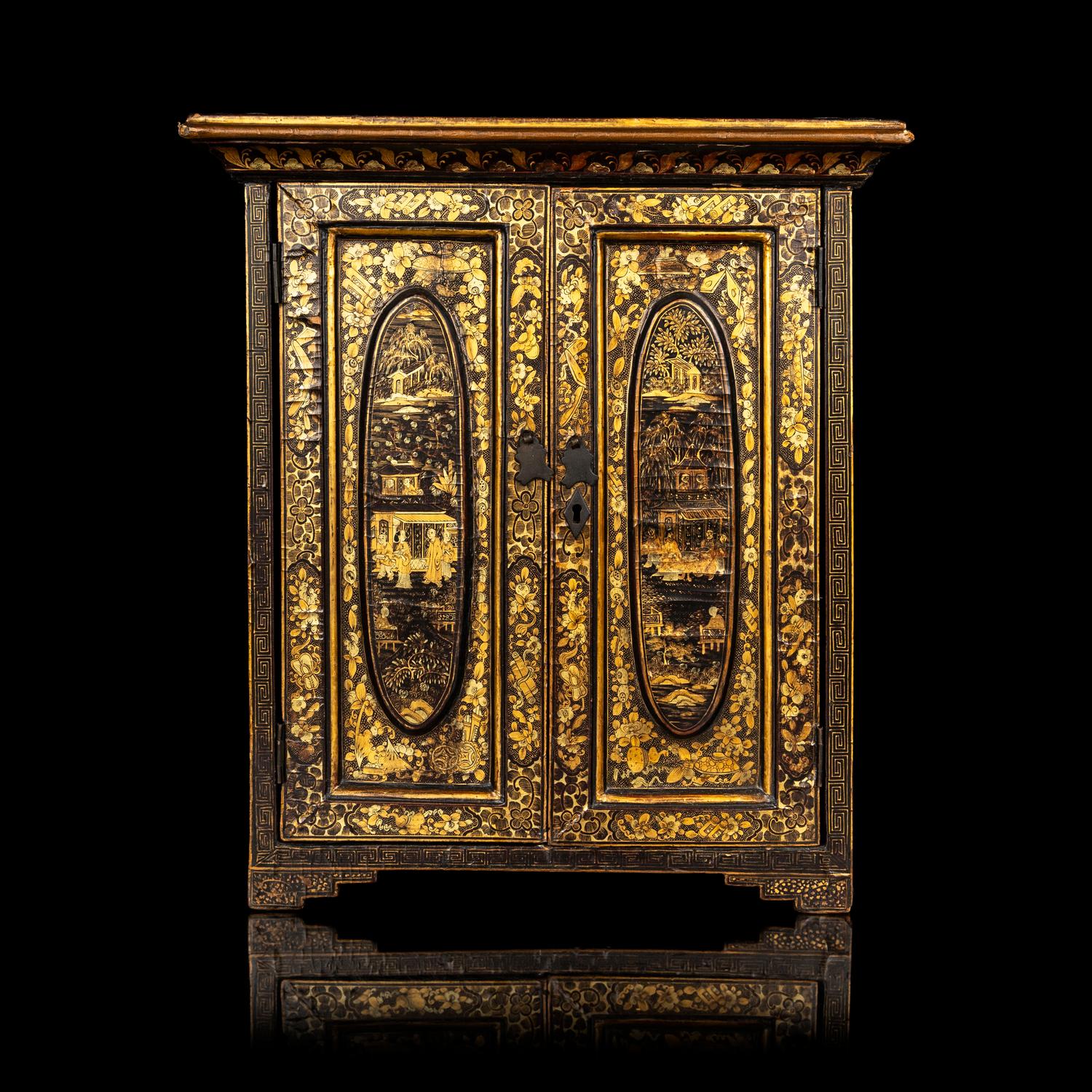 A Chinese Export Gilt Decorated Black Lacquered Chest