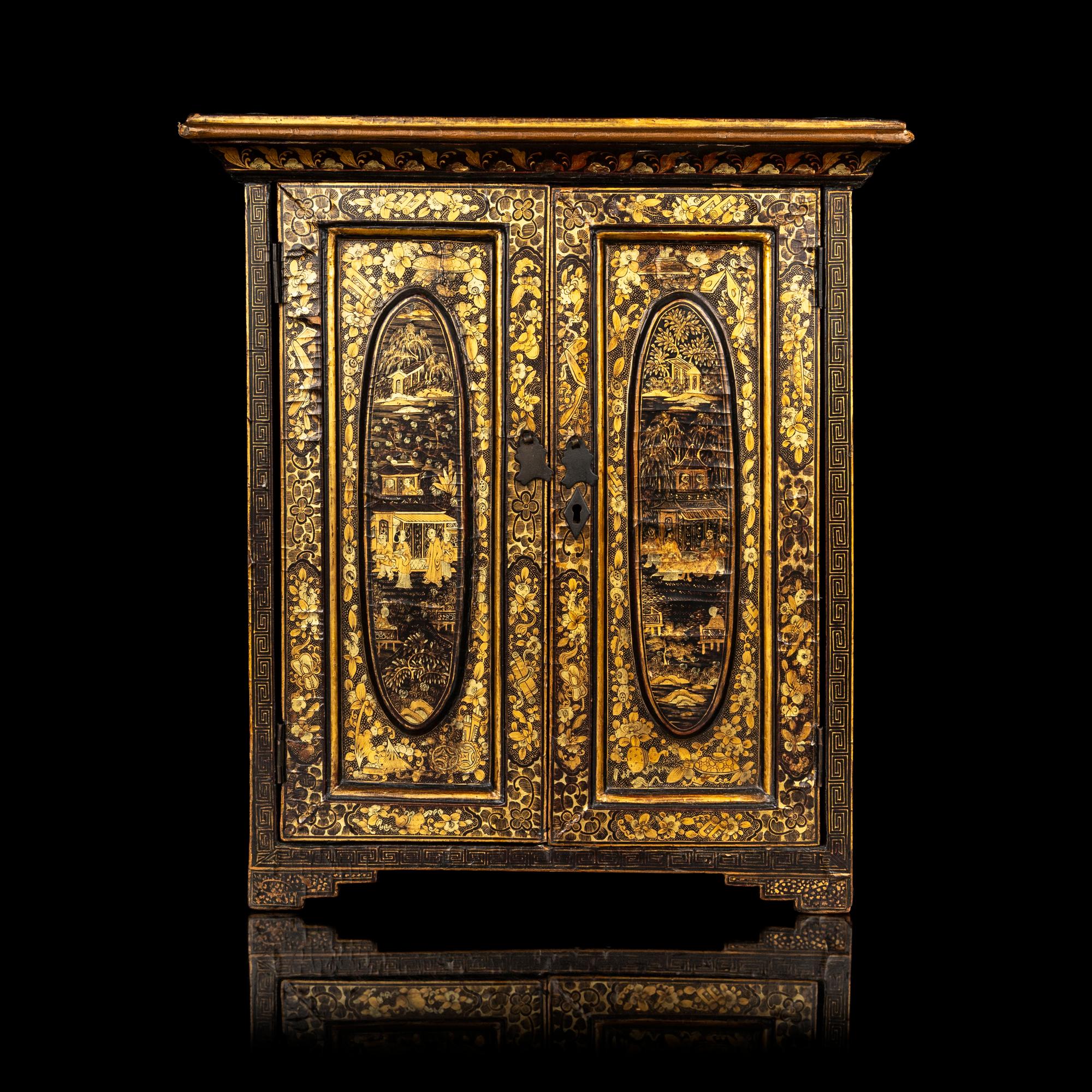 A Chinese Export Gilt Decorated Black Lacquered Chest