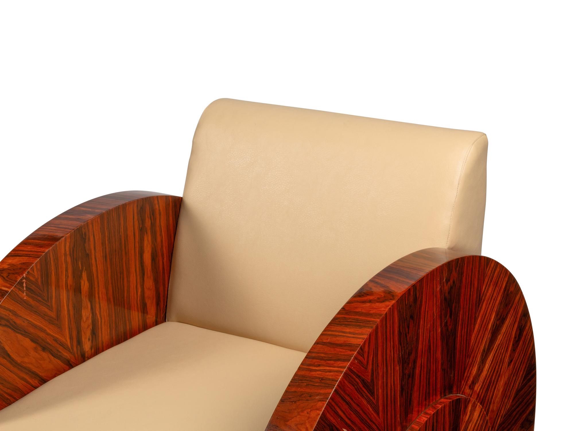 A Pair of Art Deco Style Rosewood Lounge Chairs