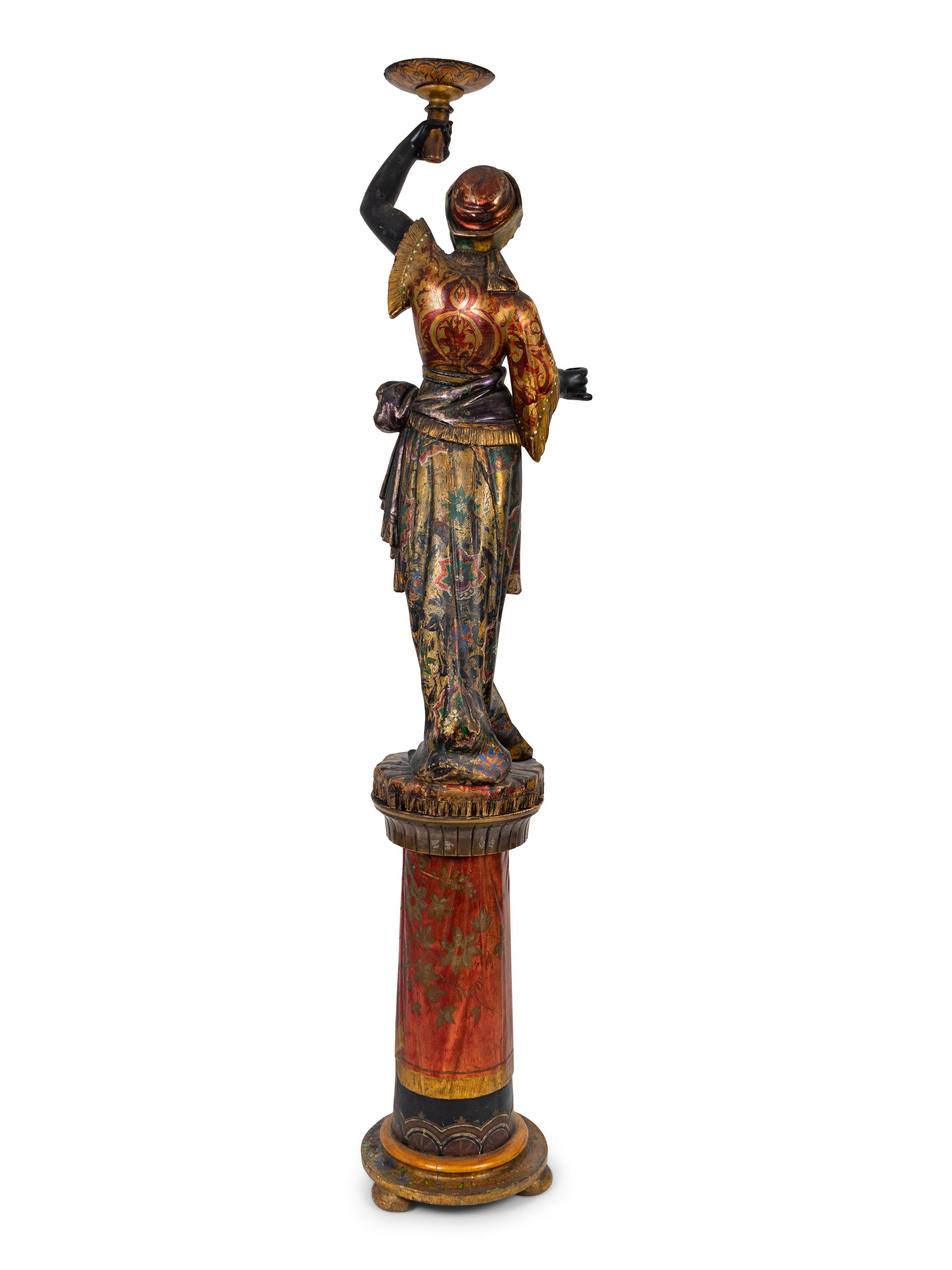 An Italian Carved and Painted Torchere of a Moor on a Pedestal Base — 19TH CENTURY