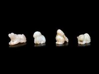 Four Chinese Pale Celadon Jade Carvings of Beasts