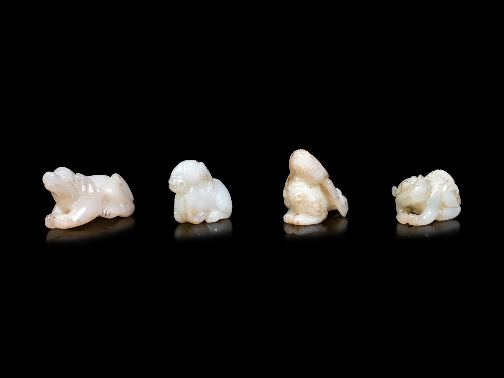 Four Chinese Pale Celadon Jade Carvings of Beasts
