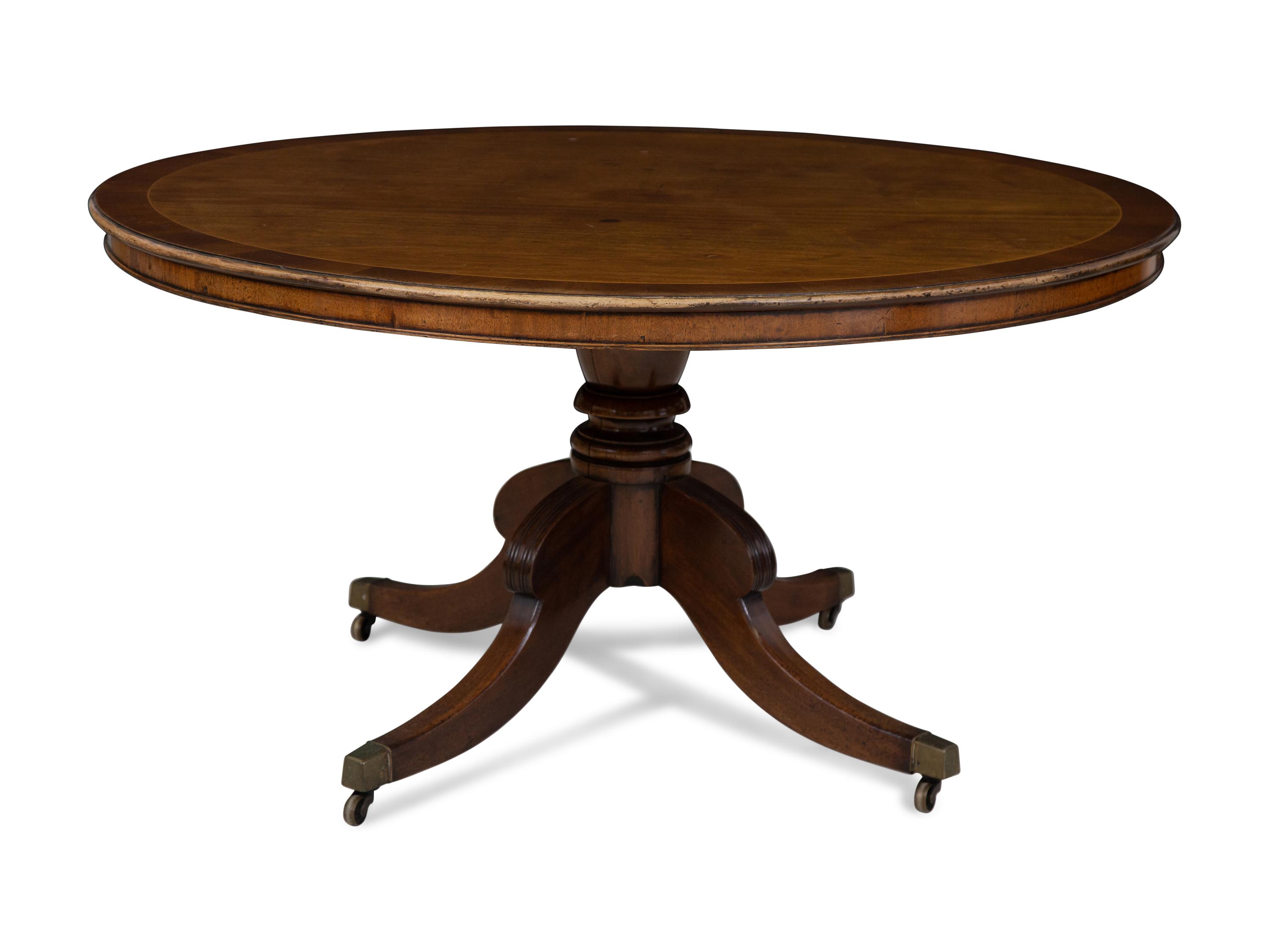 A Georgian Style Mahogany Tilt-Top Dining Table