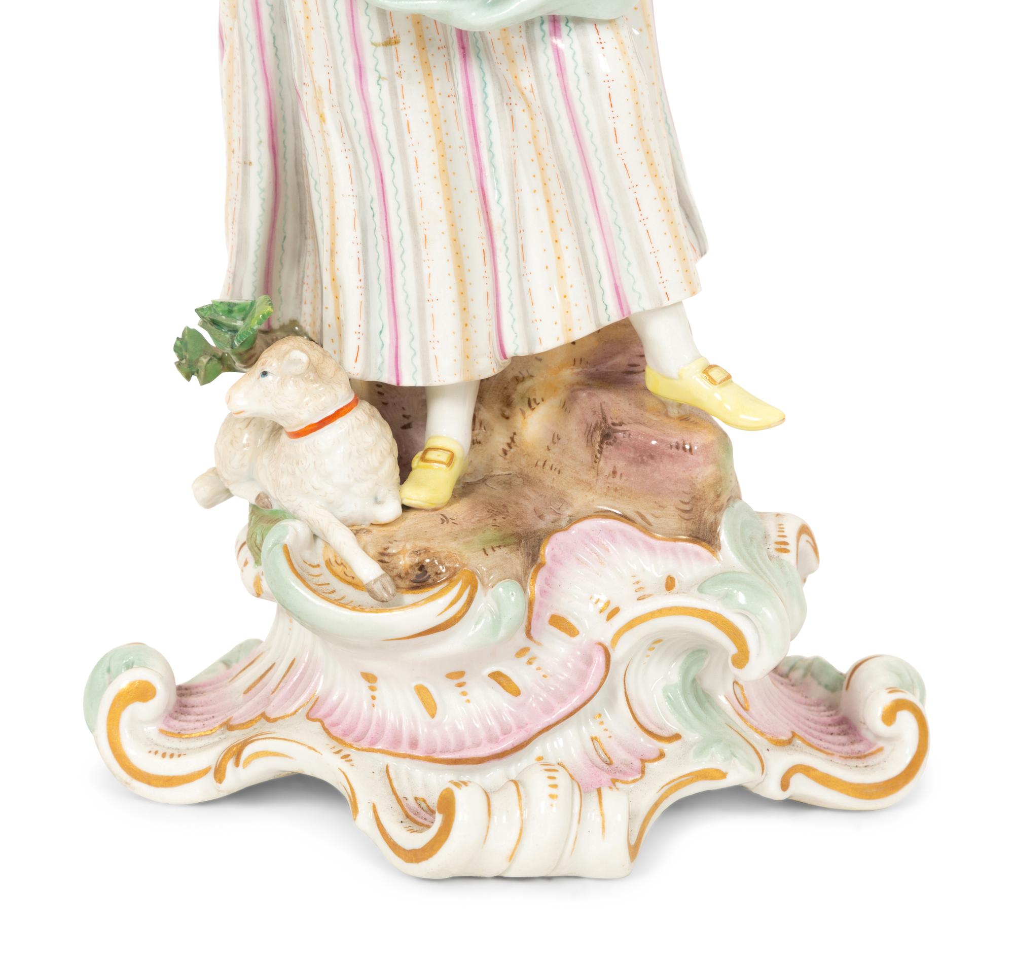 A Pair of Meissen Porcelain Figural Candelabra