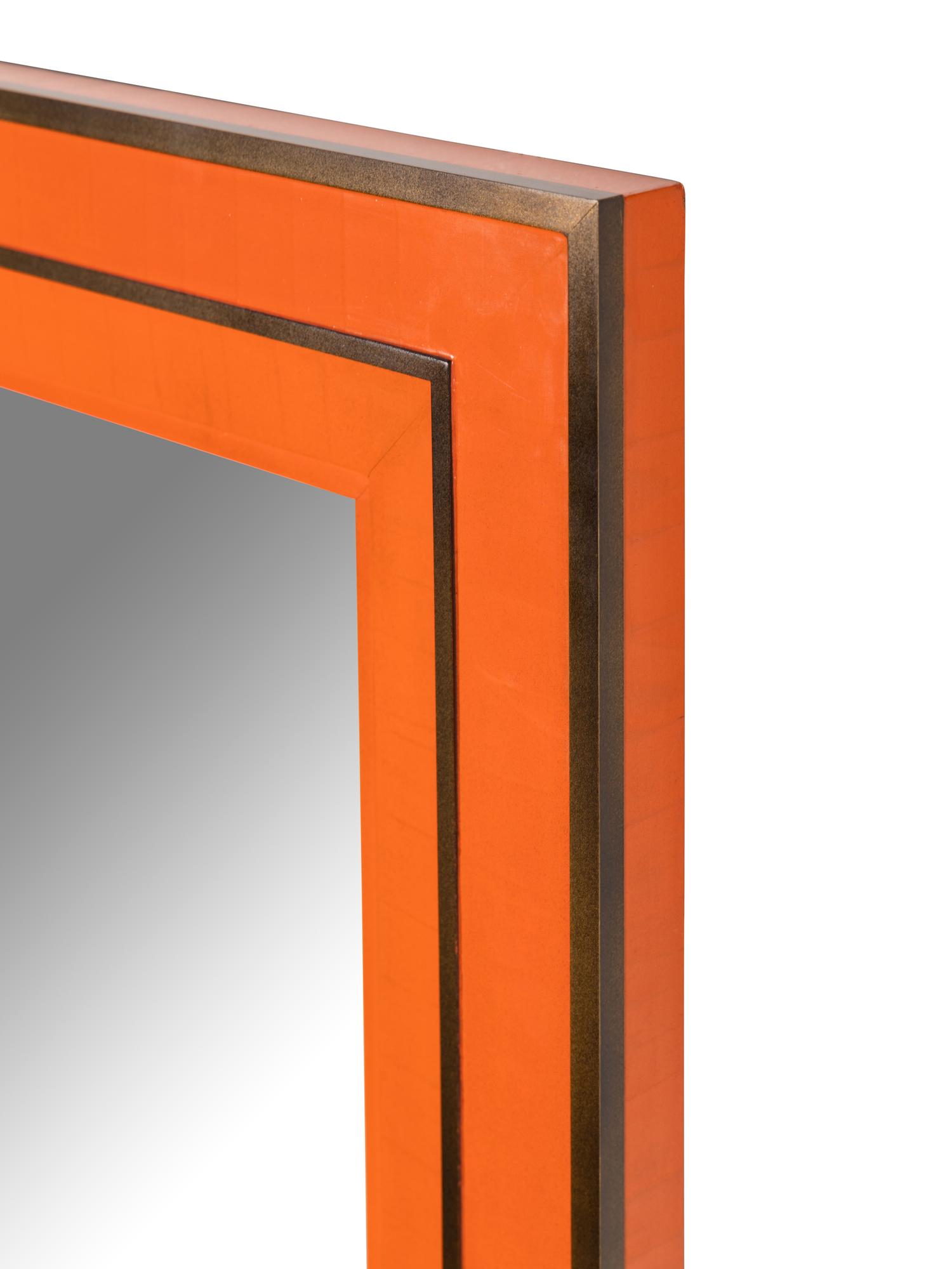 A Contemporary Orange Lacquer and Brass Mirror