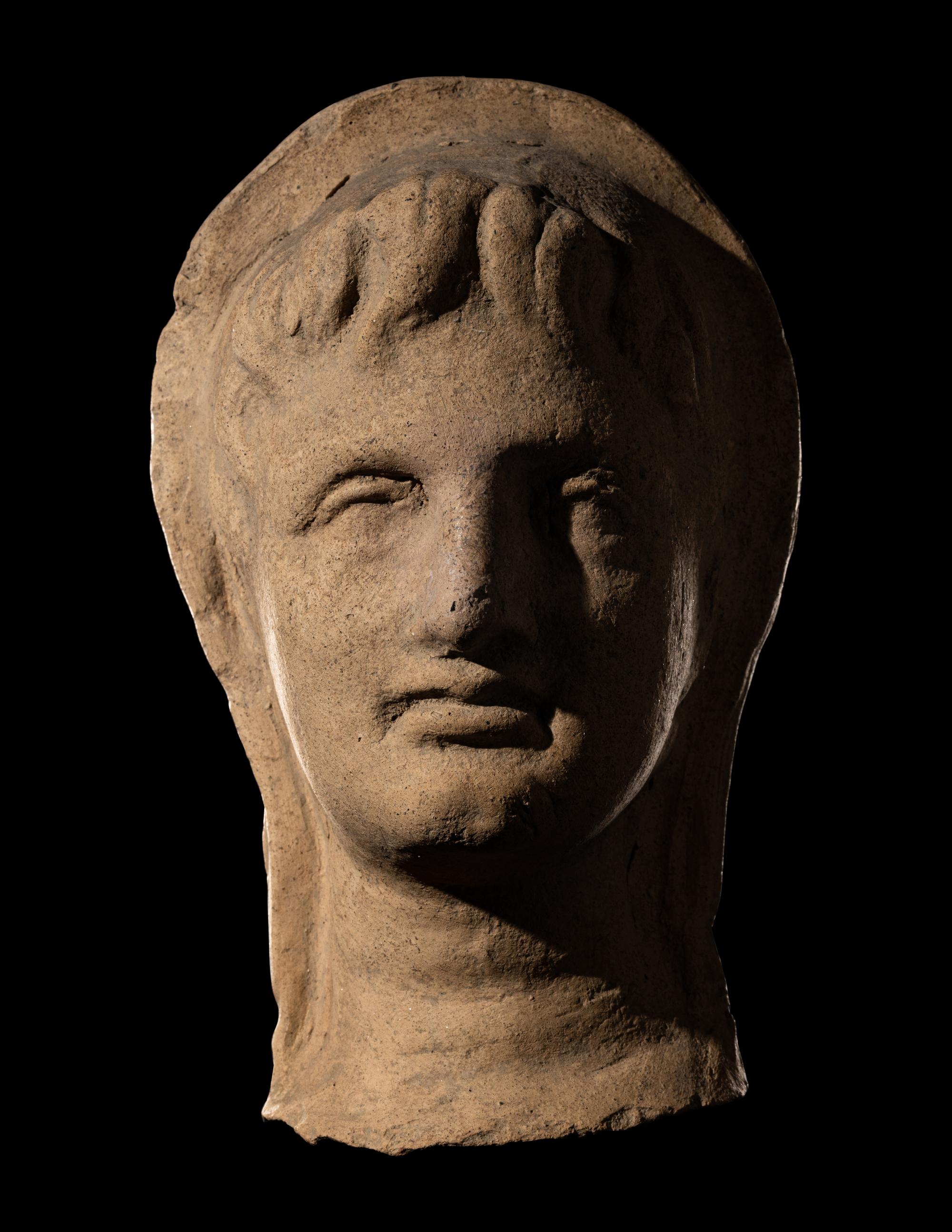 An Etruscan Terracotta Votive Head