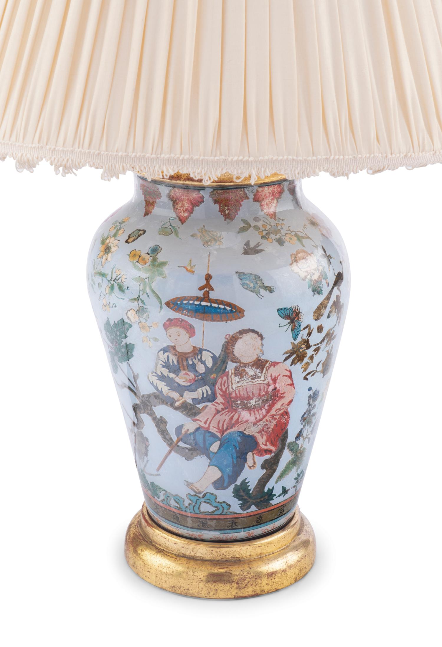 A Reverse Painted Glass and Giltwood Table Lamp