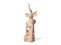 A Chinese Pottery Figure of an Earth Spirit