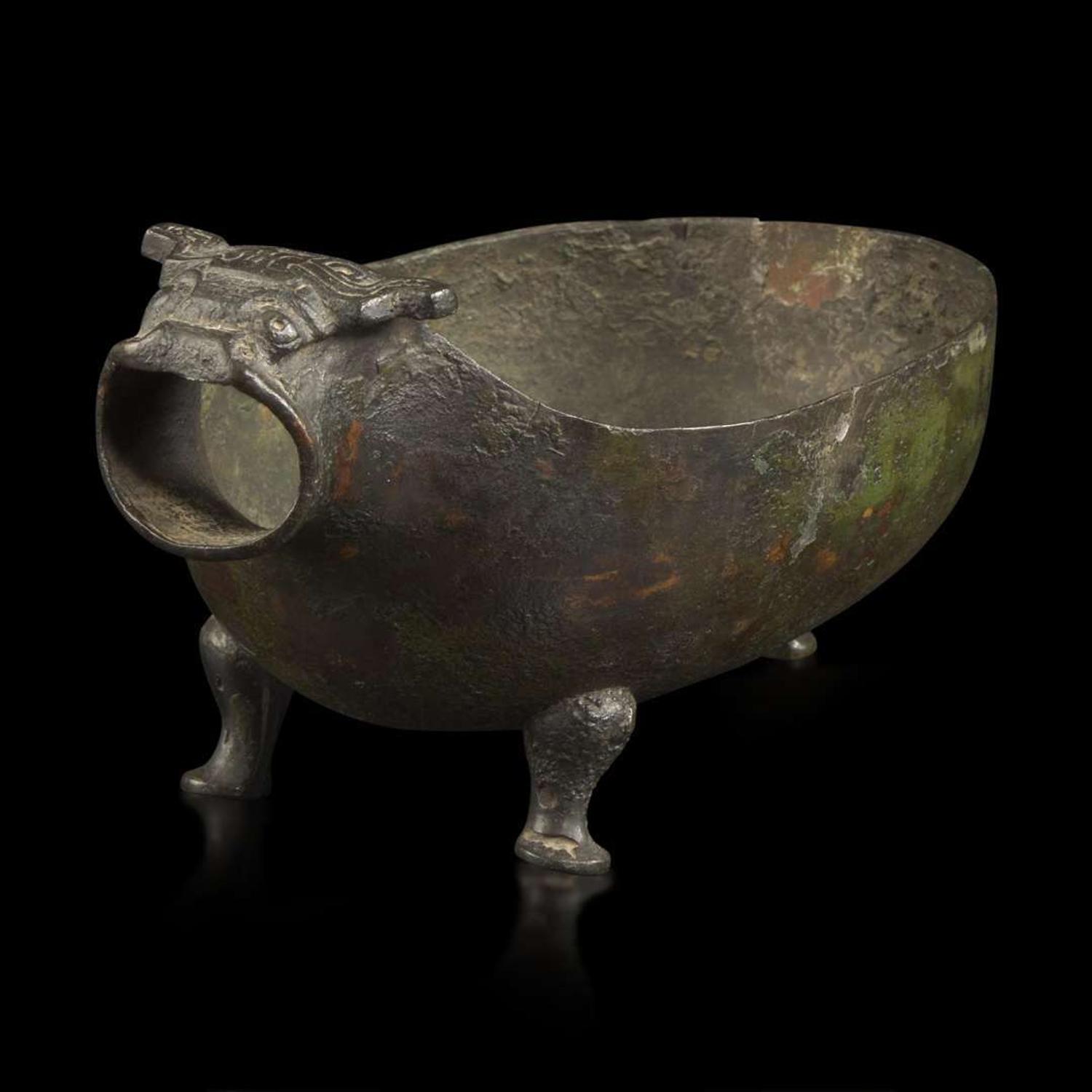 A Chinese archaic bronze animal-form pouring vessel, Yi 青铜兽形匜 Late Eastern Zhou period ????