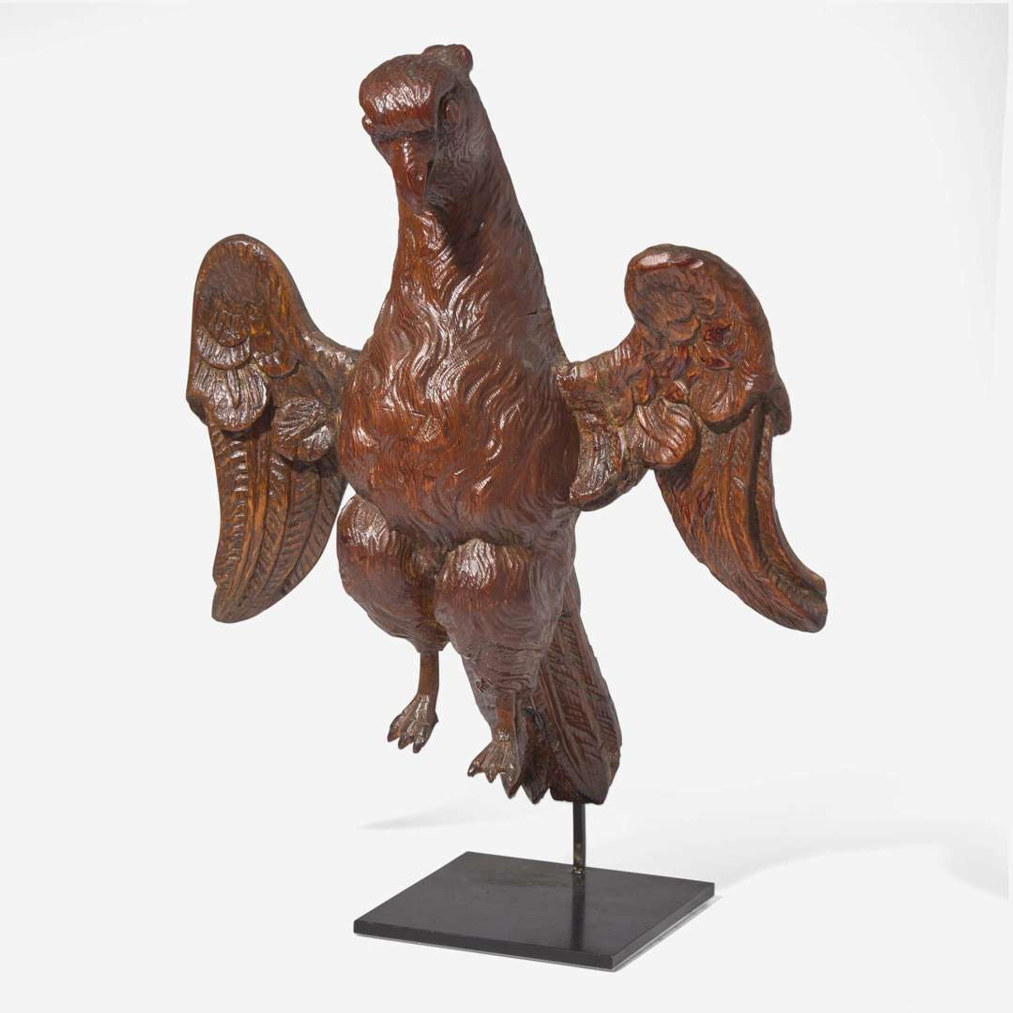 A Georgian carved pine eagle finial or cartouche English, 18th century