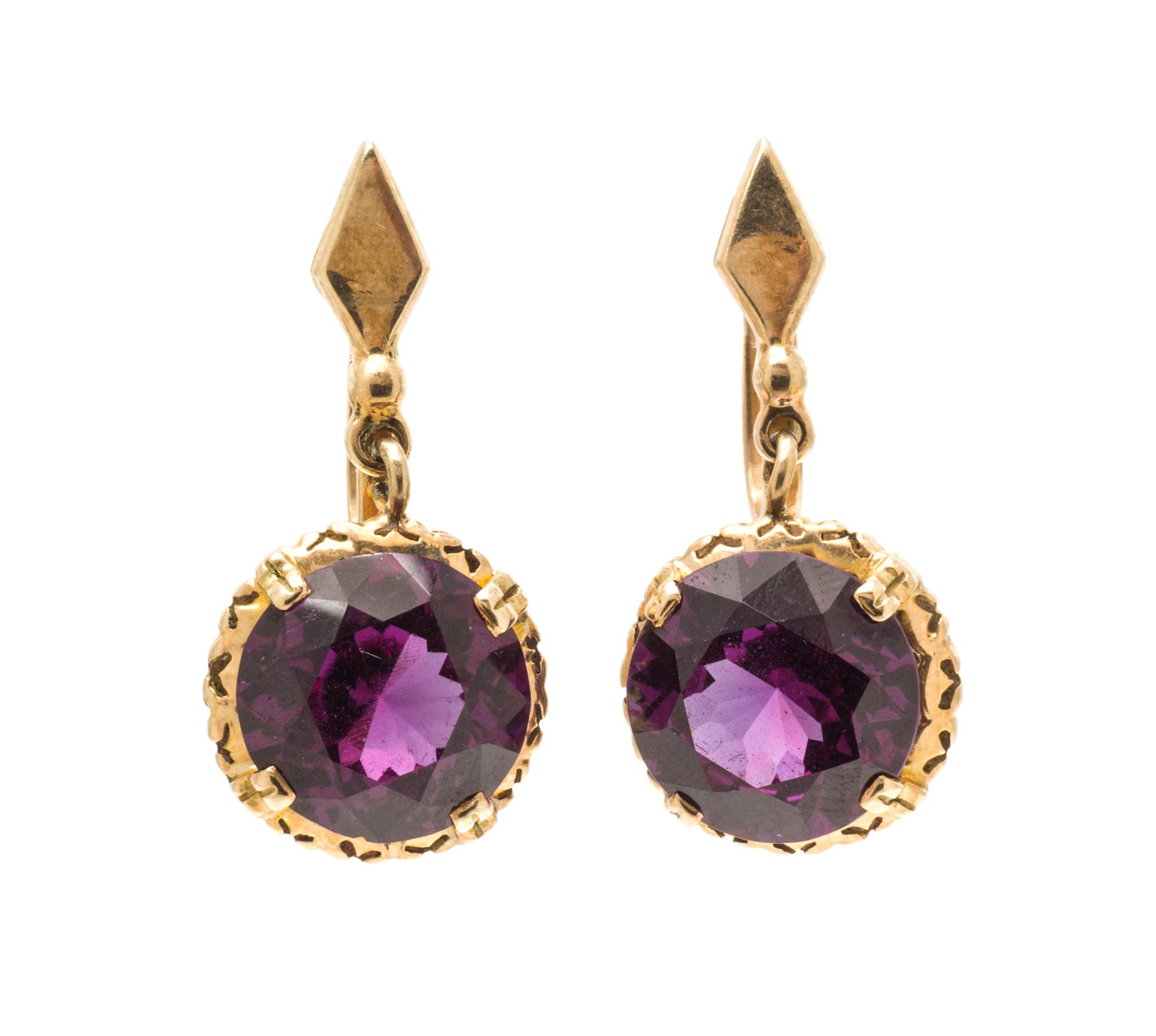 A Collection of 14 Karat Yellow Gold and Synthetic Gemstone Jewelry, 31.10 dwts.