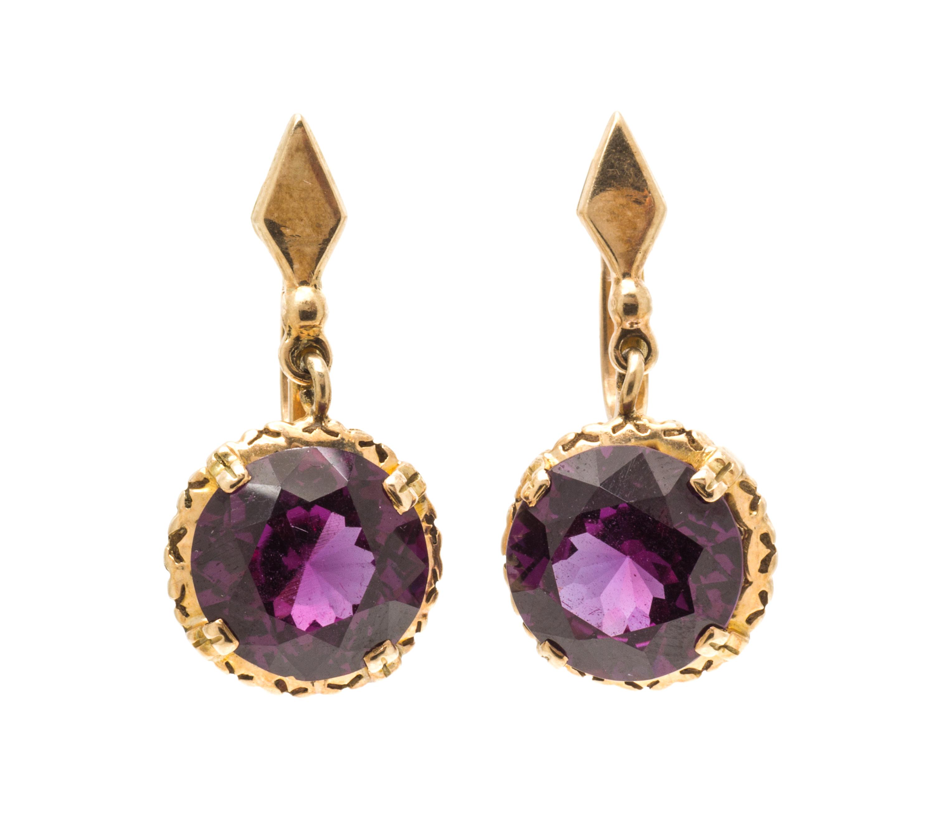 A Collection of 14 Karat Yellow Gold and Synthetic Gemstone Jewelry, 31.10 dwts.