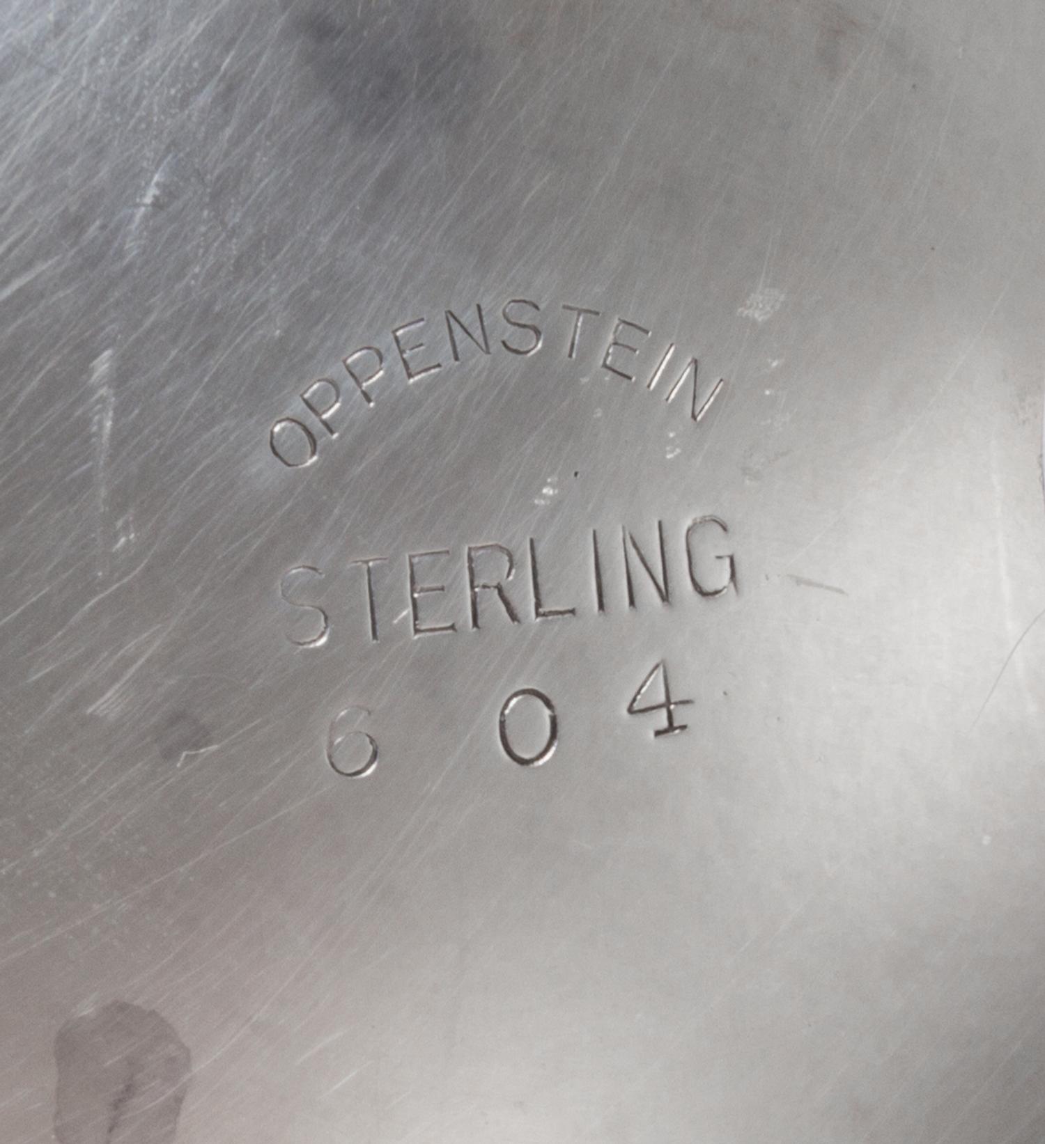 An American Silver Bowl, Openstein, of deep circular form with a flaring rim, on a short circular foot, gadrooned borders, engraved nea