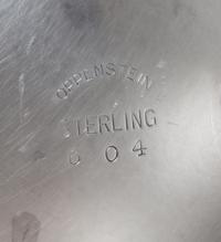An American Silver Bowl, Openstein, of deep circular form with a flaring rim, on a short circular foot, gadrooned borders, engraved nea