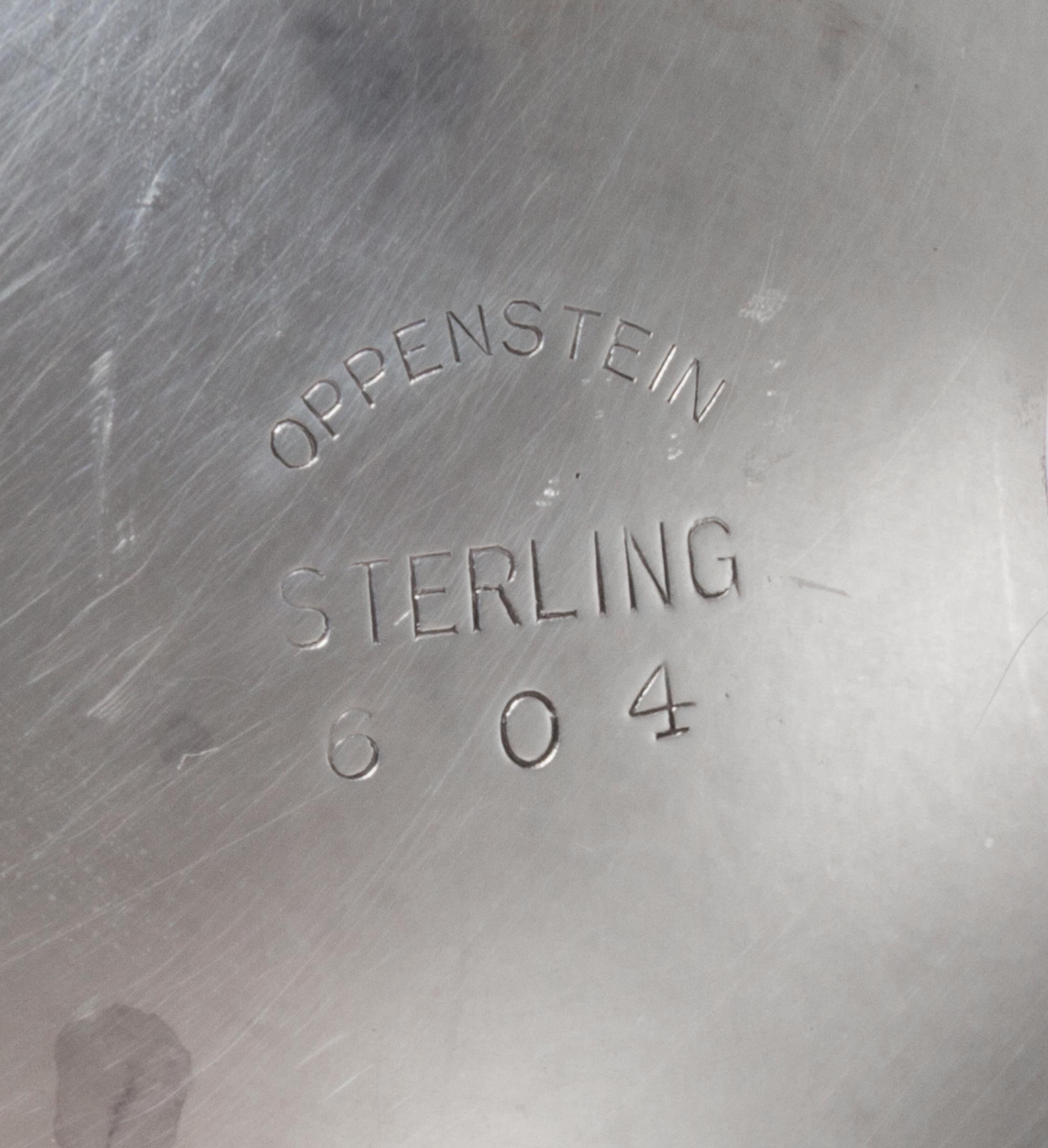 An American Silver Bowl, Openstein, of deep circular form with a flaring rim, on a short circular foot, gadrooned borders, engraved nea