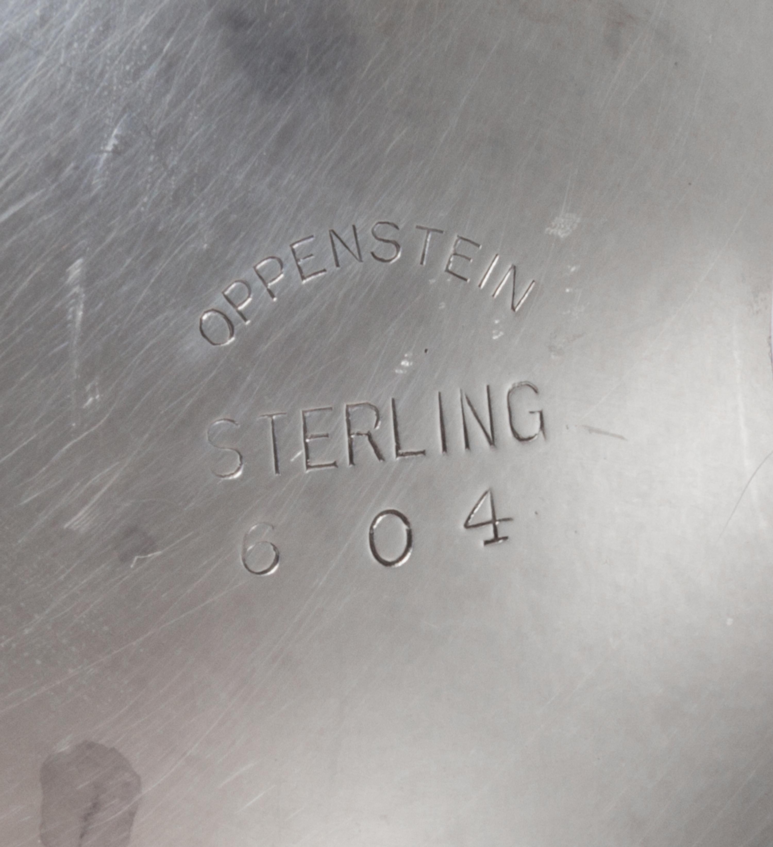 An American Silver Bowl, Openstein, of deep circular form with a flaring rim, on a short circular foot, gadrooned borders, engraved nea