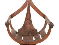 An Italian Carved Mahogany Gondola Chair with Swivel Seat