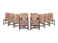 A Set of Eight Renaissance Style Carved Walnut Dining Chairs