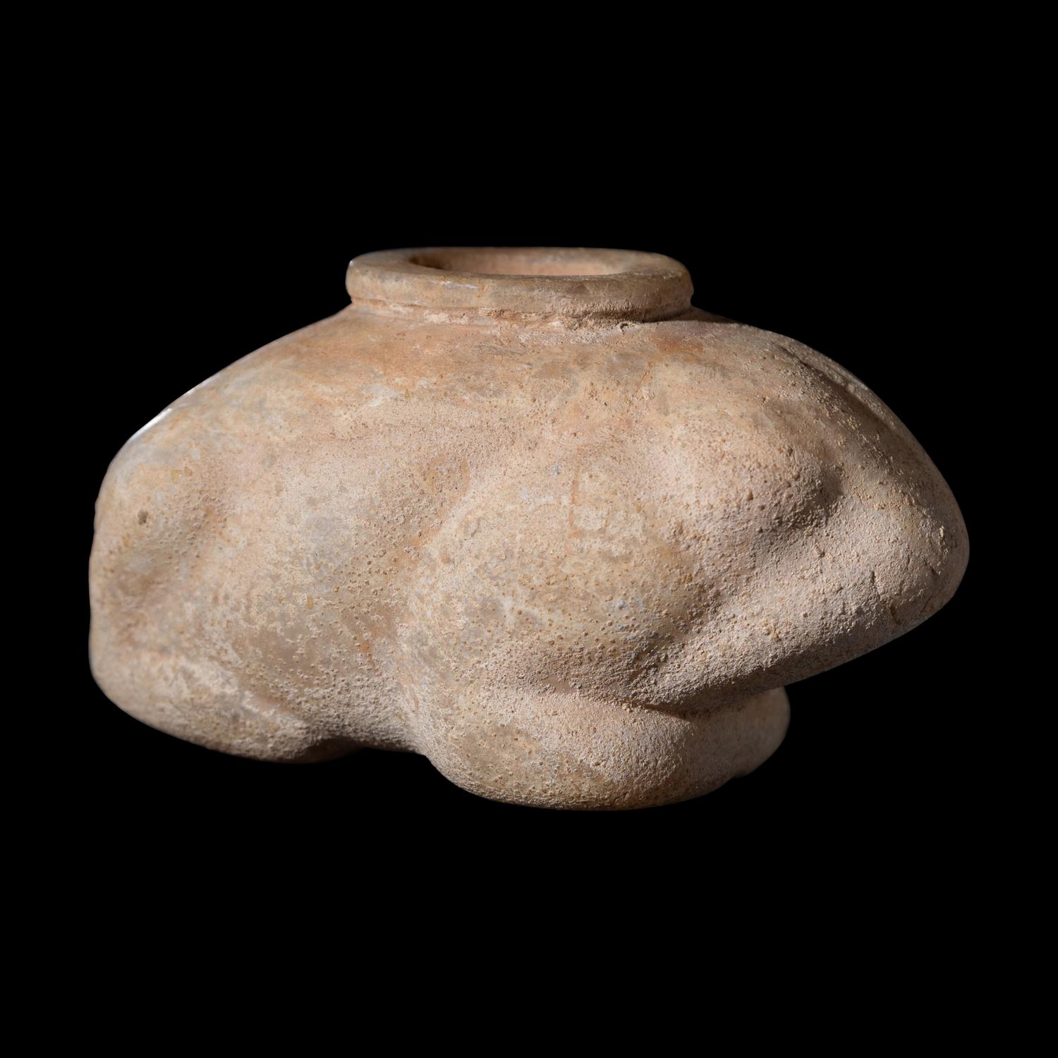 An Egyptian Calcite Frog Vessel