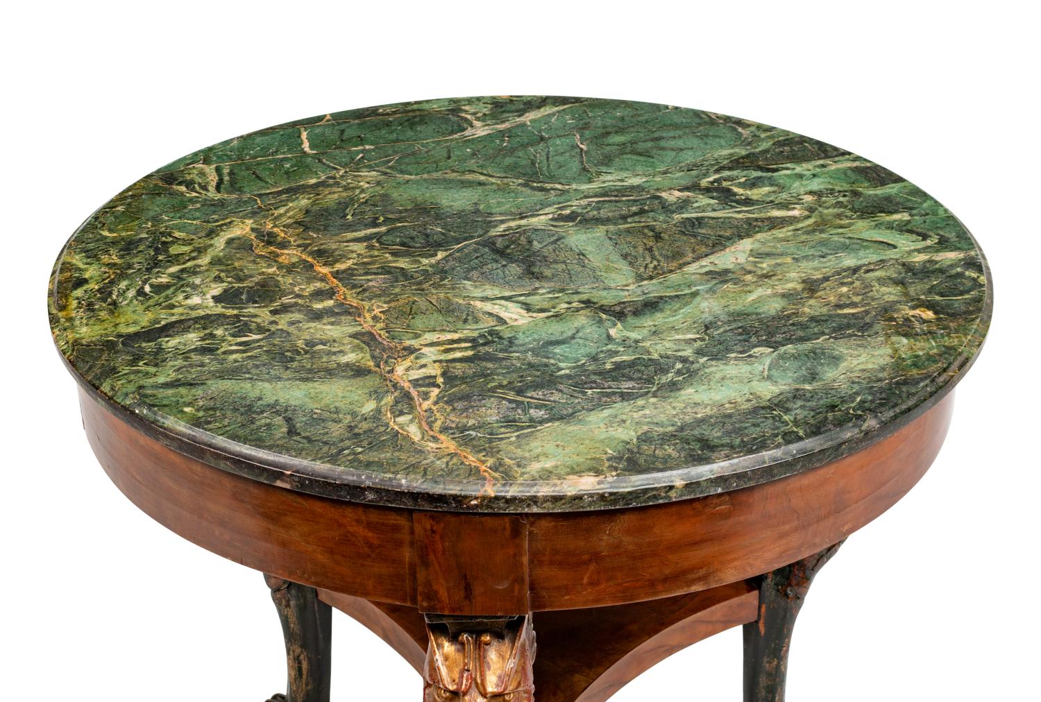 An Empire Style Parcel-Gilt Mahogany Table