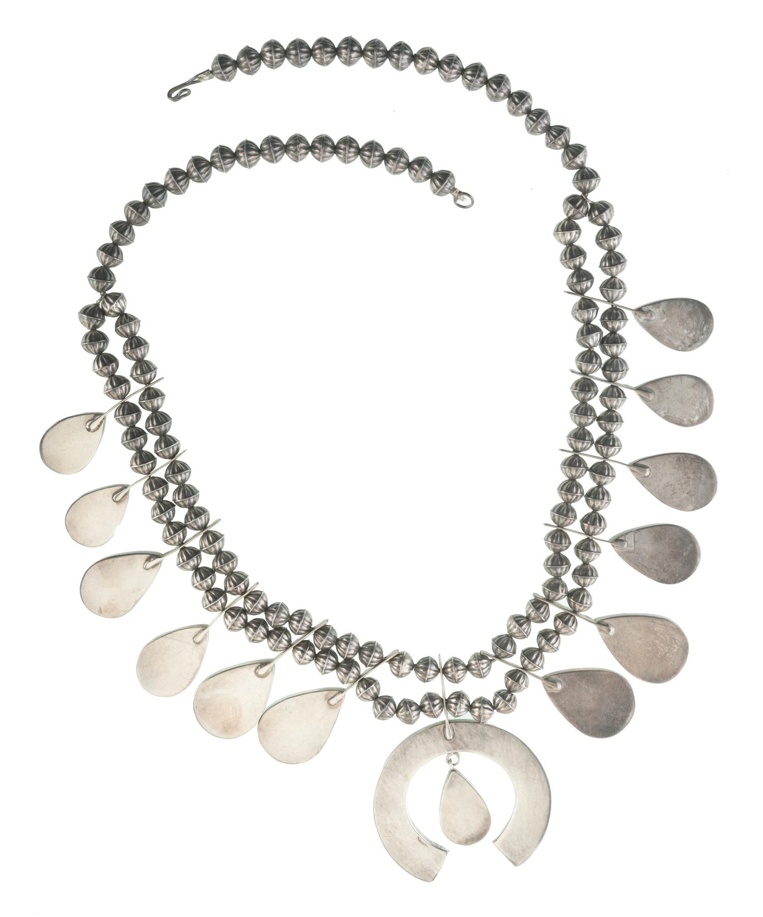 Zuni Silver Squash Blossom Necklace, Earring, and Cuff Bracelet Suite Lot is located and will ship from Denver, Colorado.
