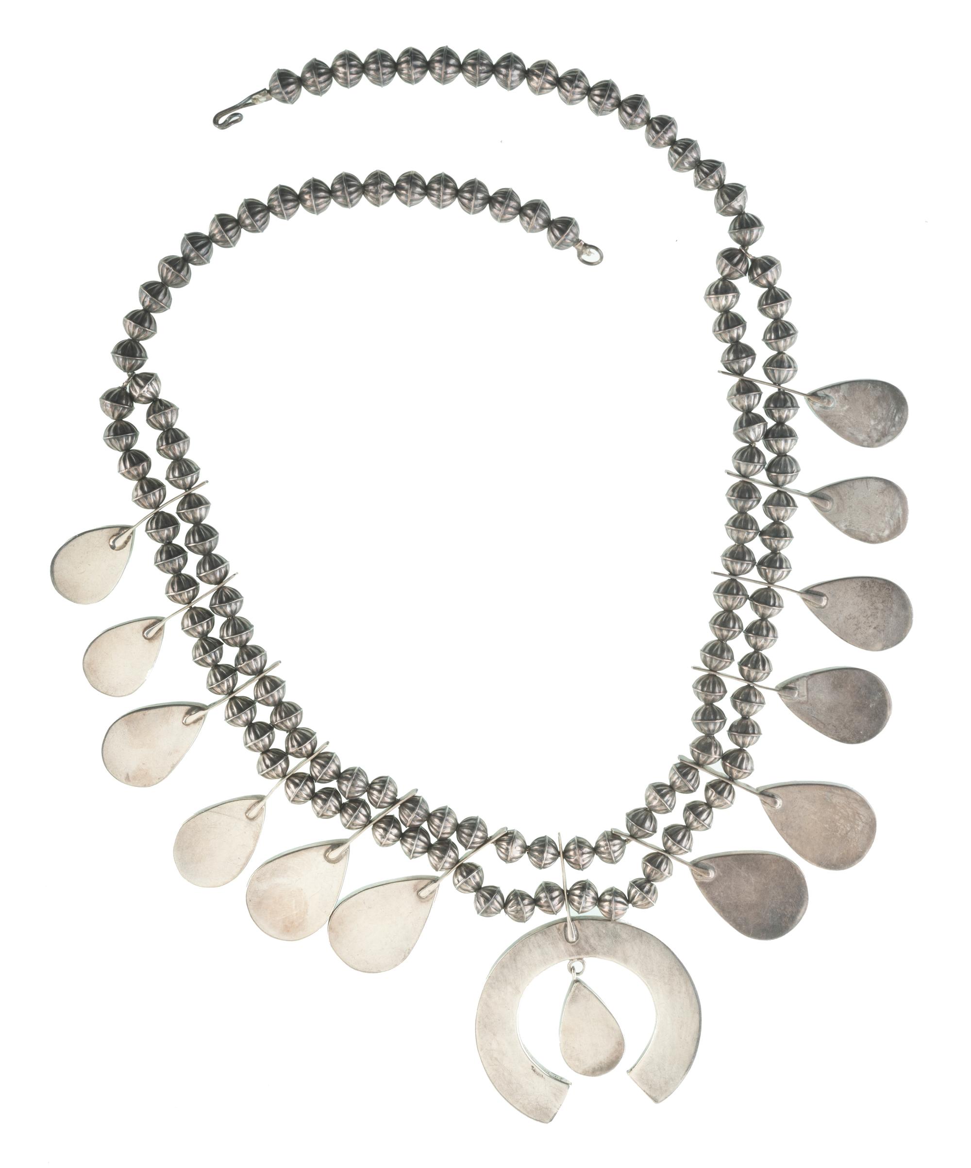 Zuni Silver Squash Blossom Necklace, Earring, and Cuff Bracelet Suite Lot is located and will ship from Denver, Colorado.