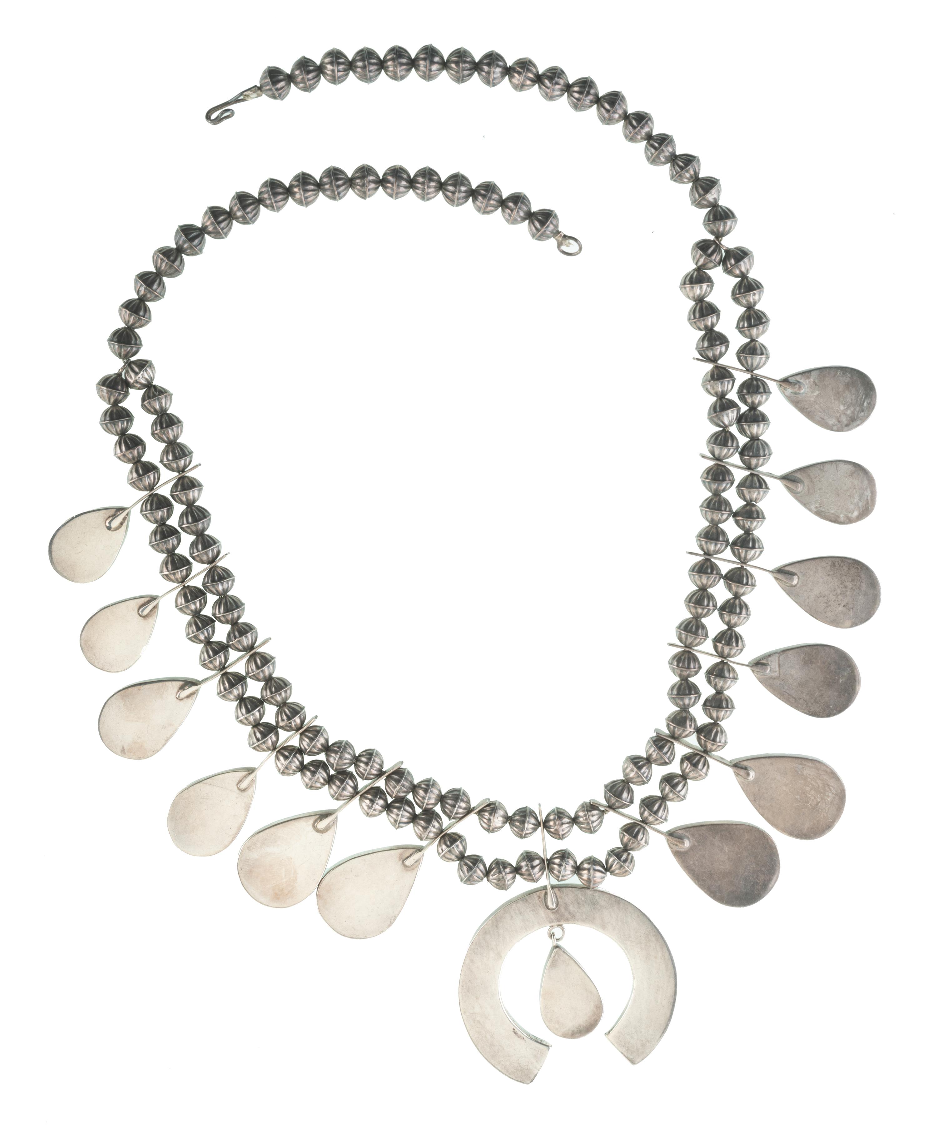 Zuni Silver Squash Blossom Necklace, Earring, and Cuff Bracelet Suite Lot is located and will ship from Denver, Colorado.