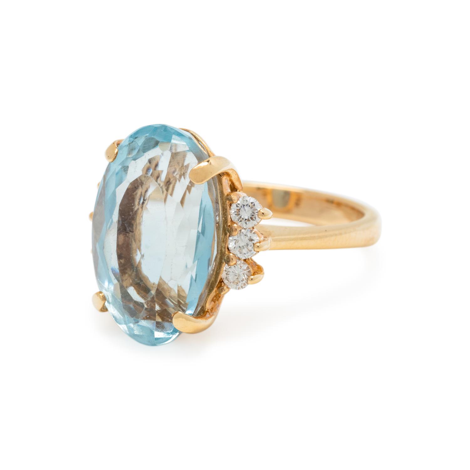 BLUE TOPAZ AND DIAMOND RING
