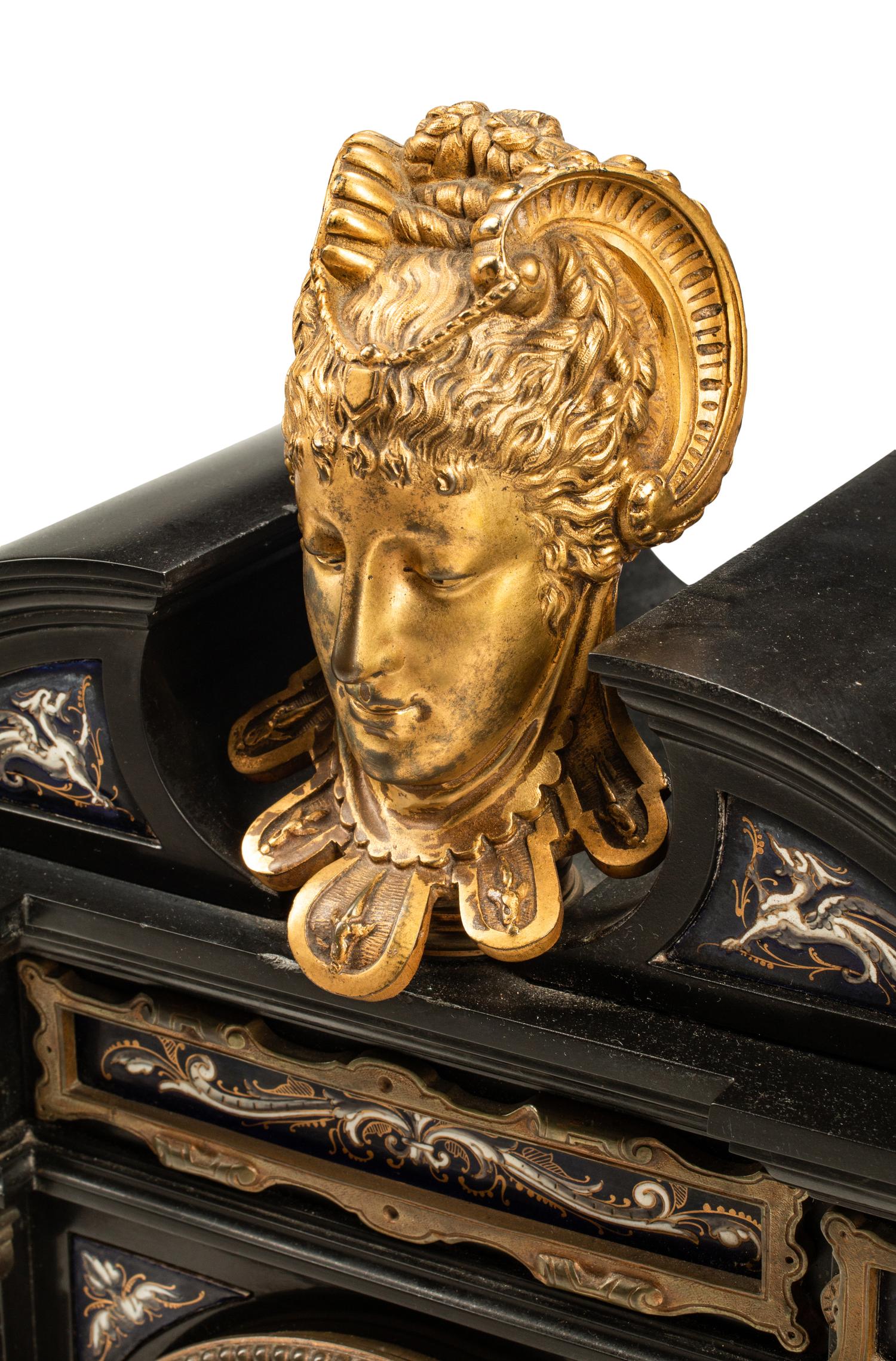 A French Gilt Bronze Mounted and Porcelain-Inset Black Marble Clock