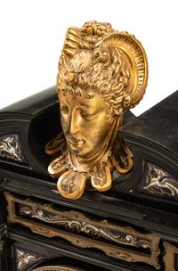 A French Gilt Bronze Mounted and Porcelain-Inset Black Marble Clock