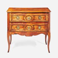 A French Directoire carved walnut commode circa 1800