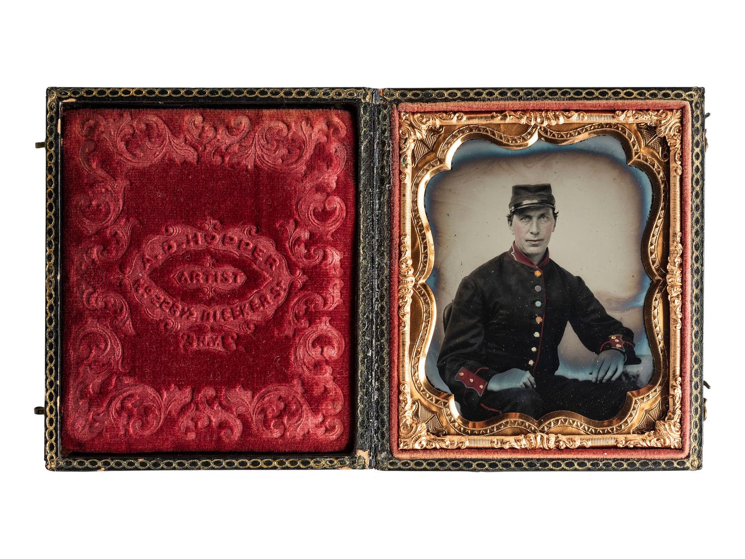 [CIVIL WAR]. Sixth plate hand-colored ambrotype portrait of a New York State Militiaman, possibly 79th NYSM, by Abraham D. HOPPER, New York, NY. Ca 1857-60.