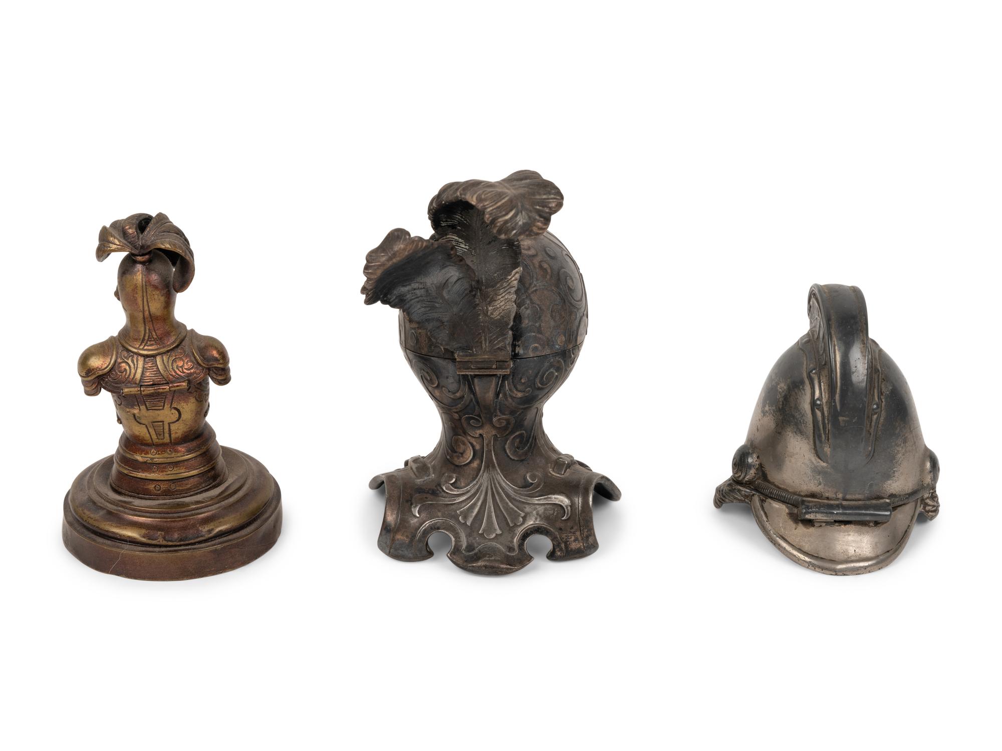 Two Knight Inkwells and a Helmet Inkwell