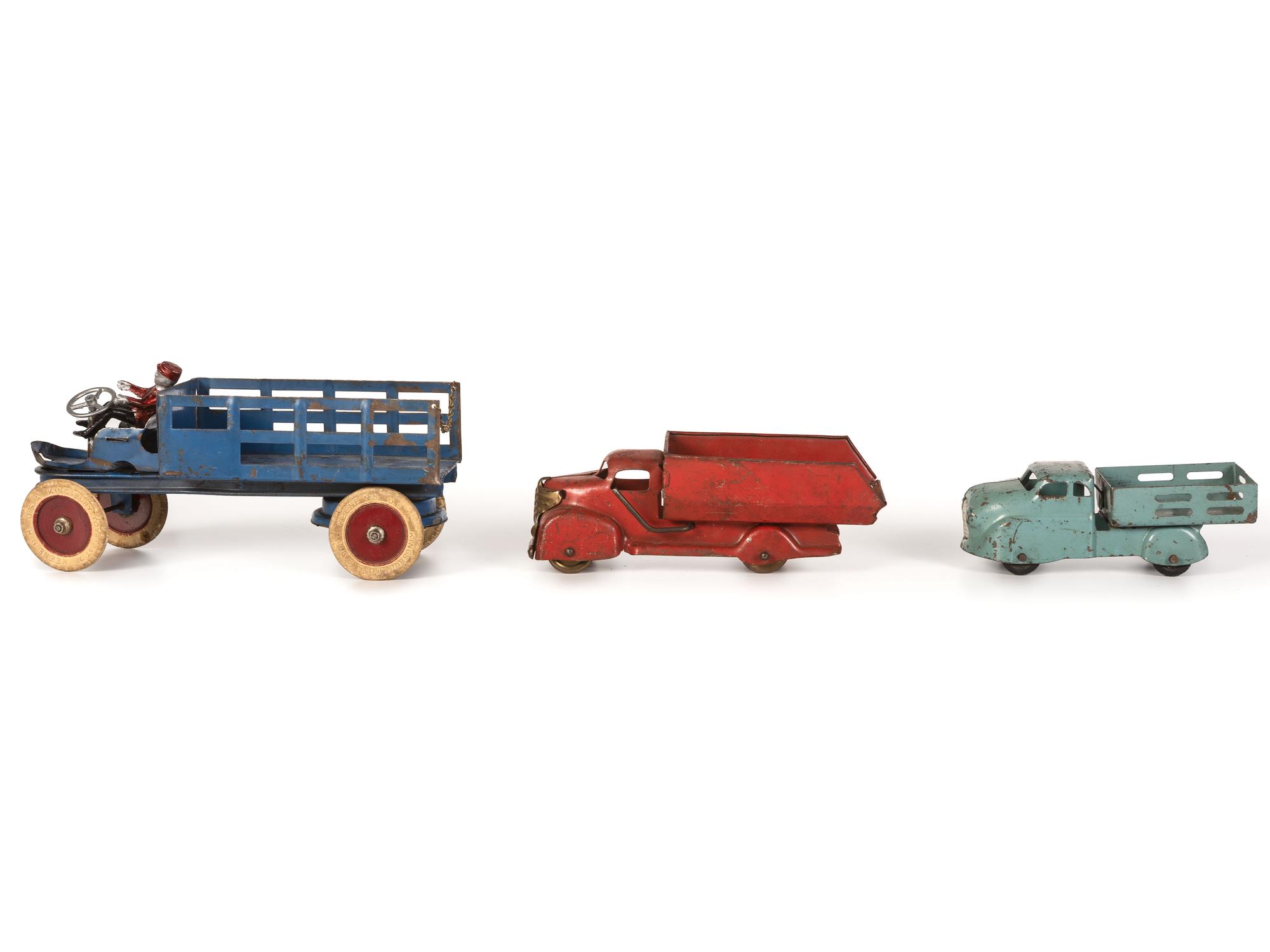 Ten Tin and Pressed Steel Toy Trucks and Wagons