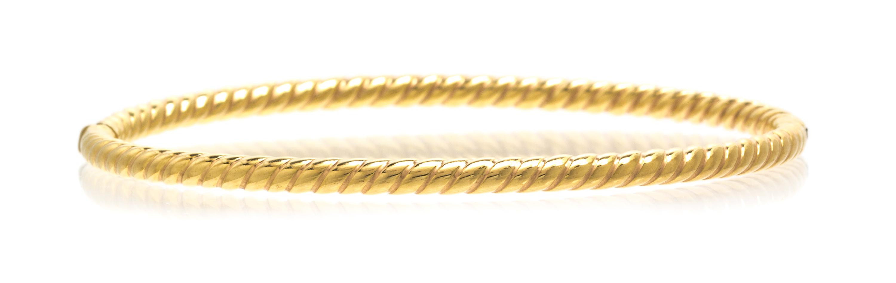An 18 Karat Yellow Gold Bangle Bracelet, 4.80 dwts.