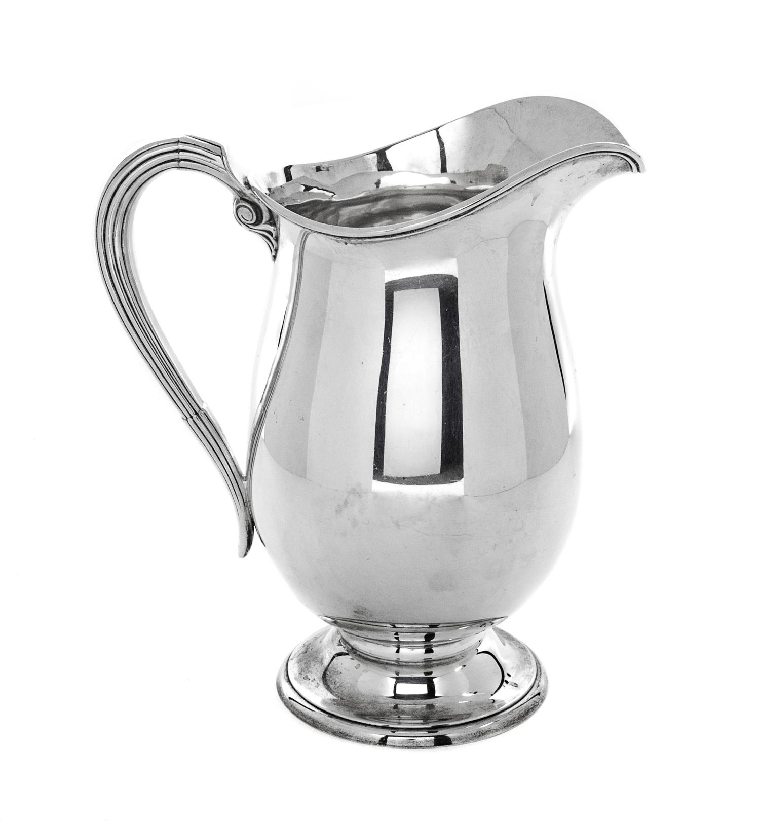 An American Silver Pitcher, International Silver Co., Meriden, CT, with reeded handle.