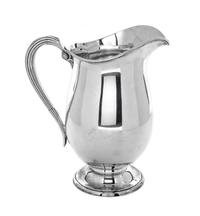 An American Silver Pitcher, International Silver Co., Meriden, CT, with reeded handle.
