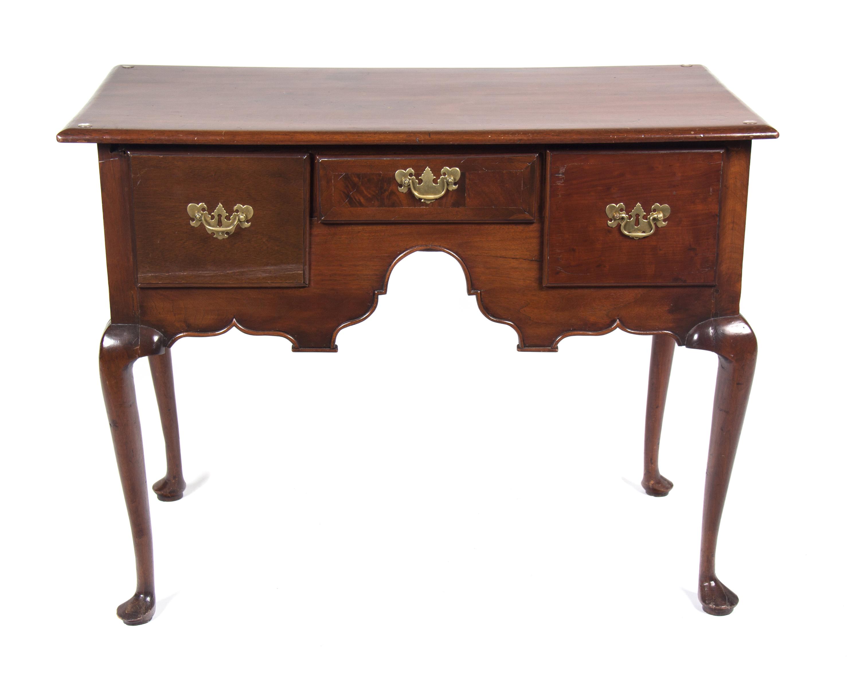 A Queen Anne Style Mahogany Lowboy Height 30 1/4 x width 39 x depth 21 1/4 inches. — 18TH/19TH CENTURY