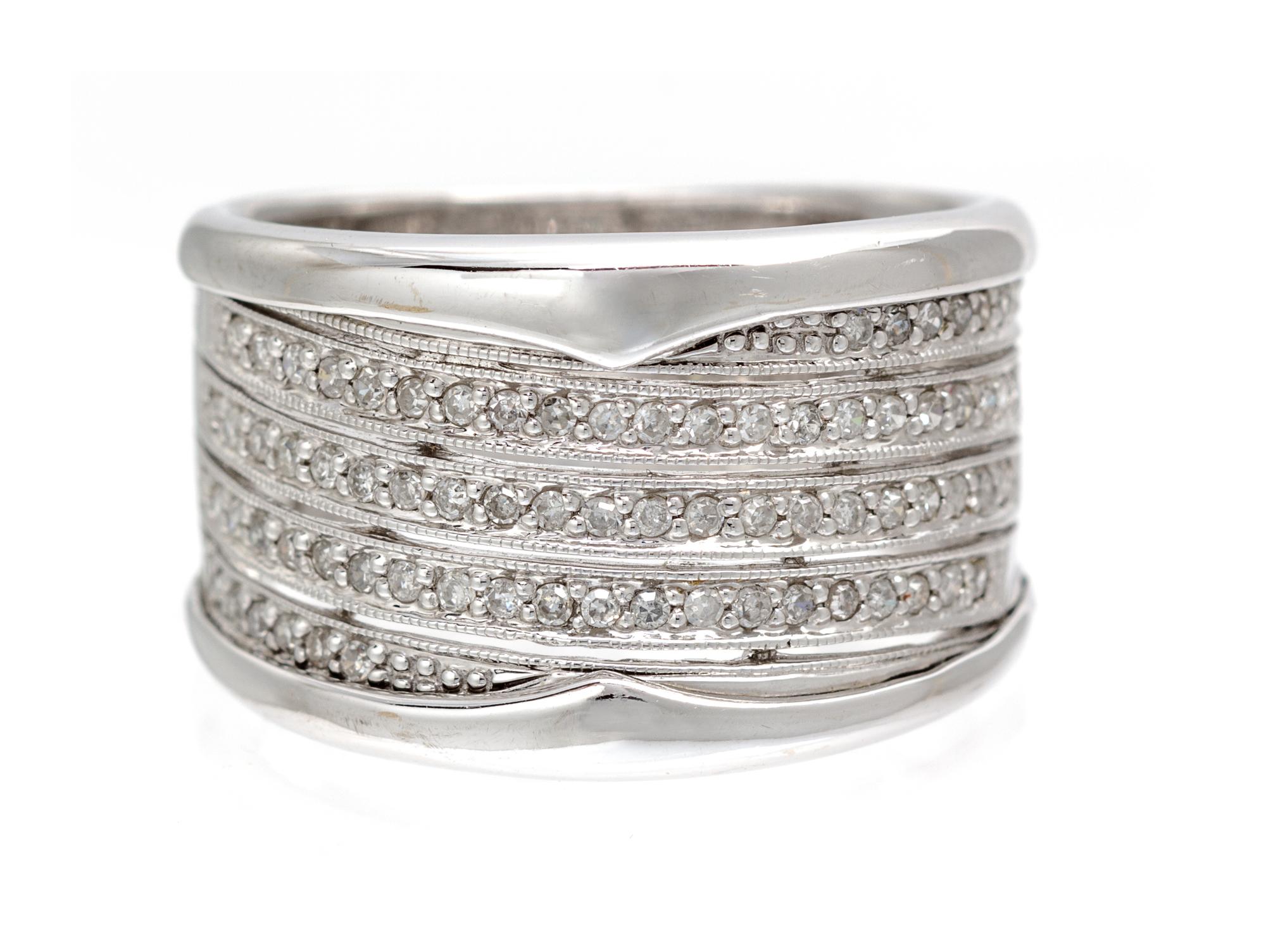 A 14 Karat White Gold and Diamond Demi Parure, 17.80 dwts.