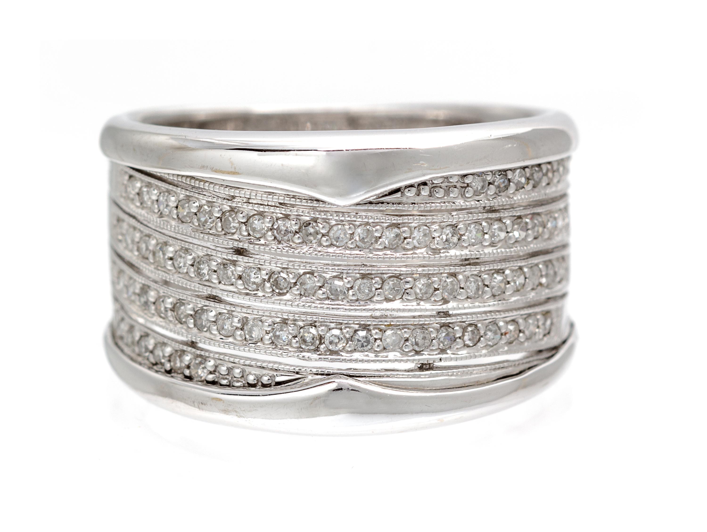 A 14 Karat White Gold and Diamond Demi Parure, 17.80 dwts.