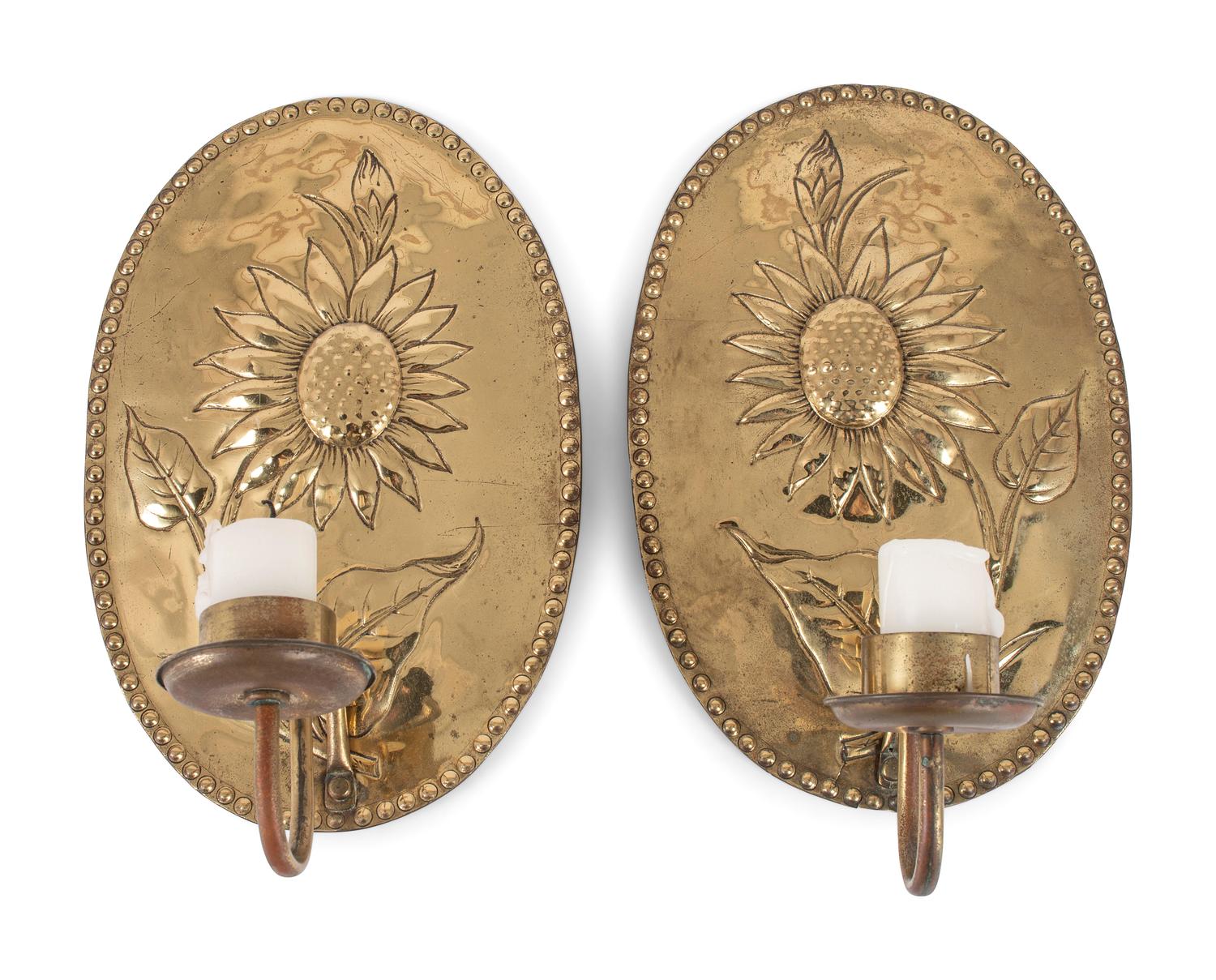 A Pair of Dutch Brass Sunflower Decorated Wall Sconces