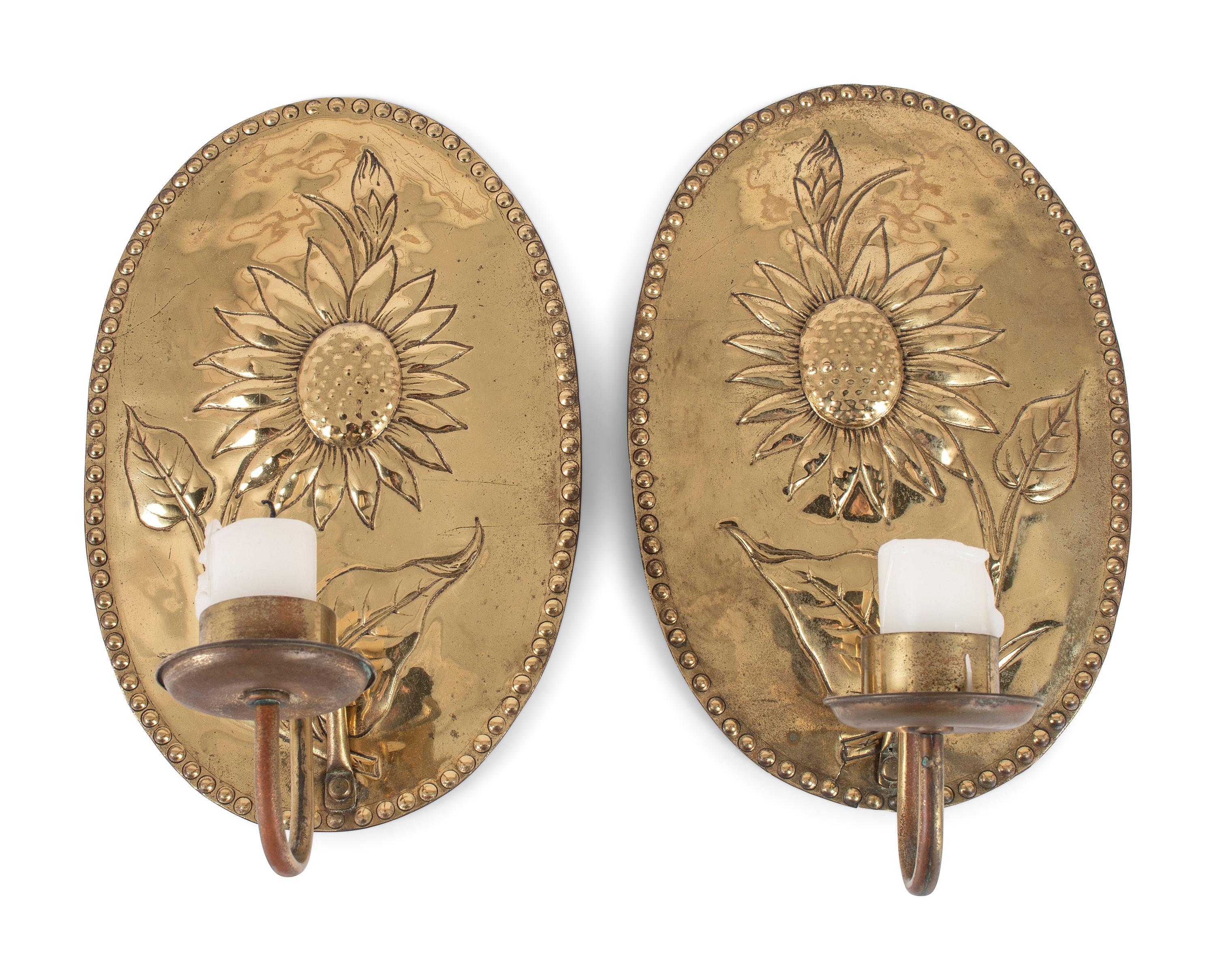 A Pair of Dutch Brass Sunflower Decorated Wall Sconces