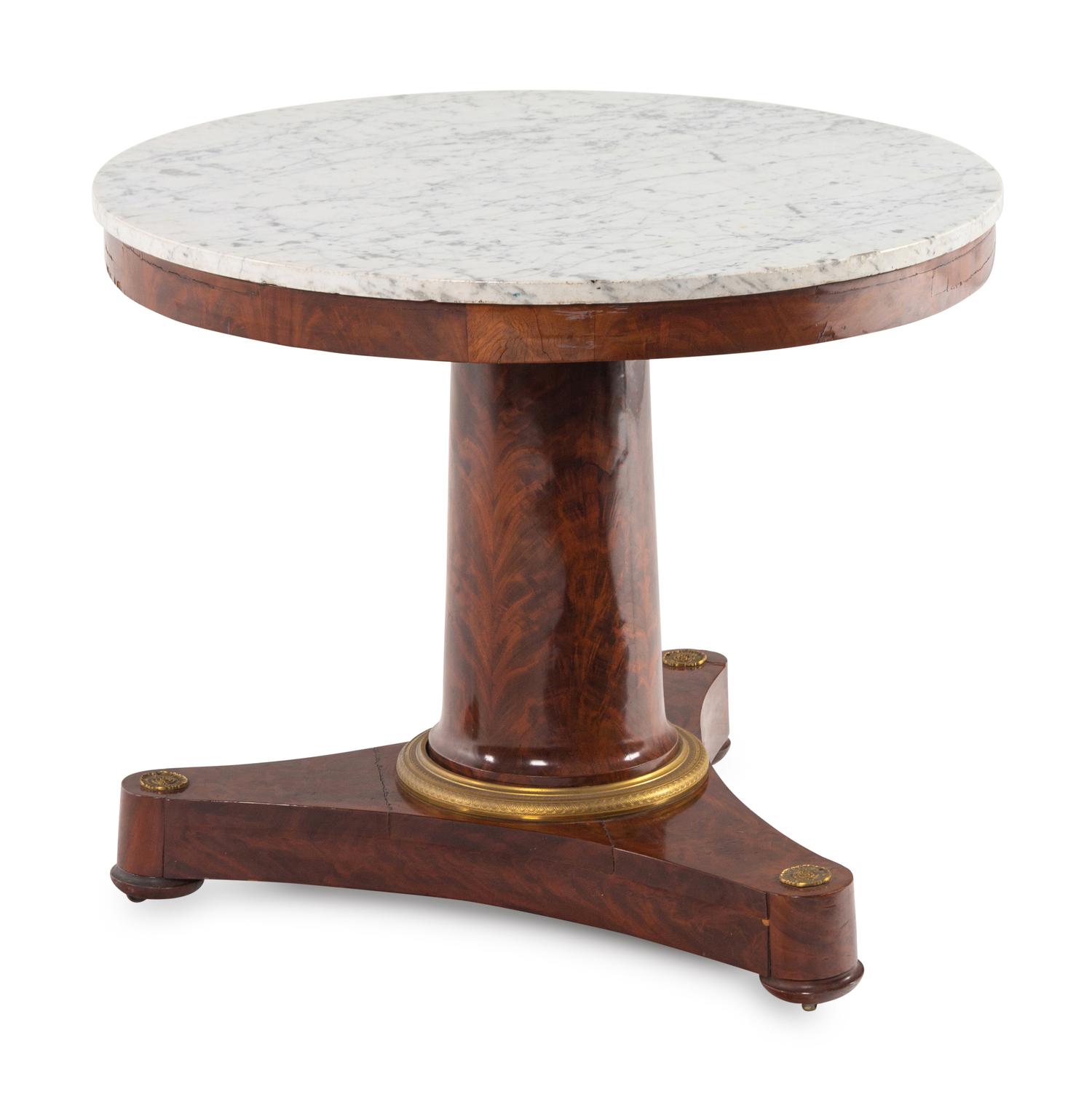 An Empire Gilt Bronze-Mounted Marble-Top Mahogany Center Table