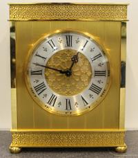 A Swiss Brass Bracket Clock. Height 10 /14 inches.
