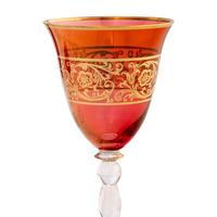 A Set of Parcel Gilt And Colored Glass Wine Stems