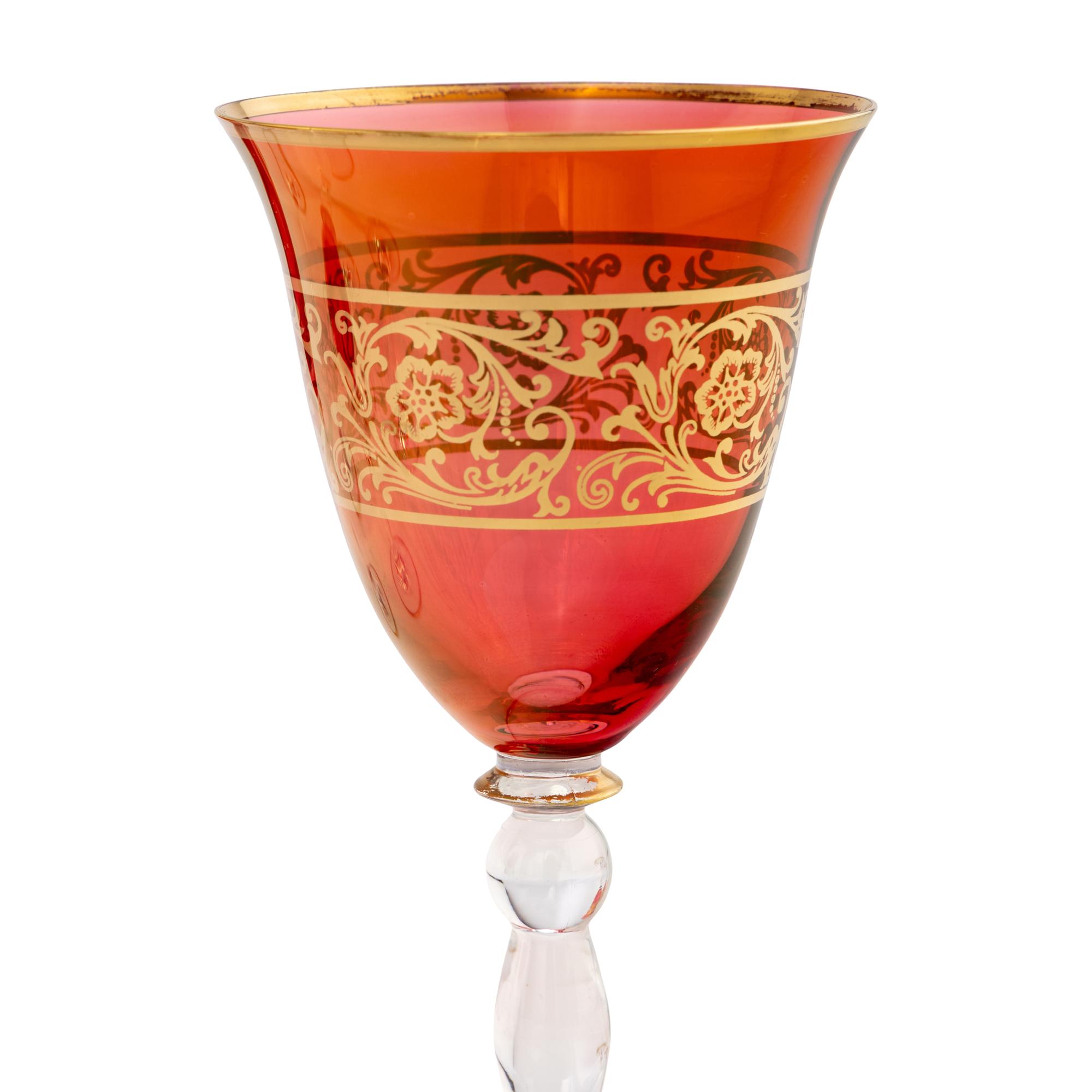 A Set of Parcel Gilt And Colored Glass Wine Stems
