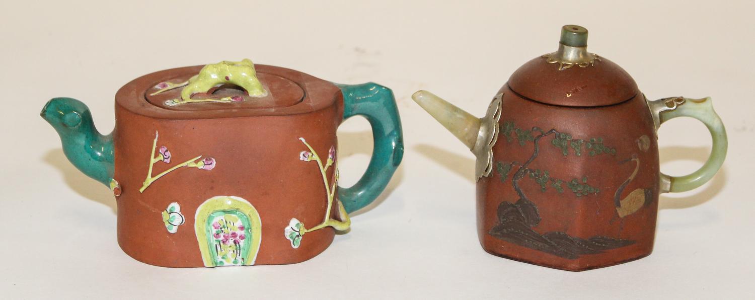 Two Yixing Pottery Teapots. Height of taller 4 3/8 inches.