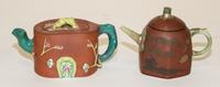 Two Yixing Pottery Teapots. Height of taller 4 3/8 inches.