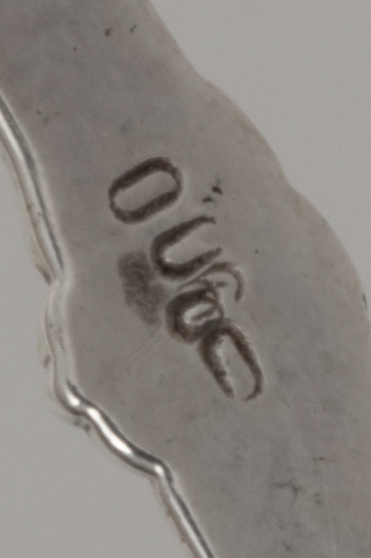 A Set of Six Silver Bowls with Handles